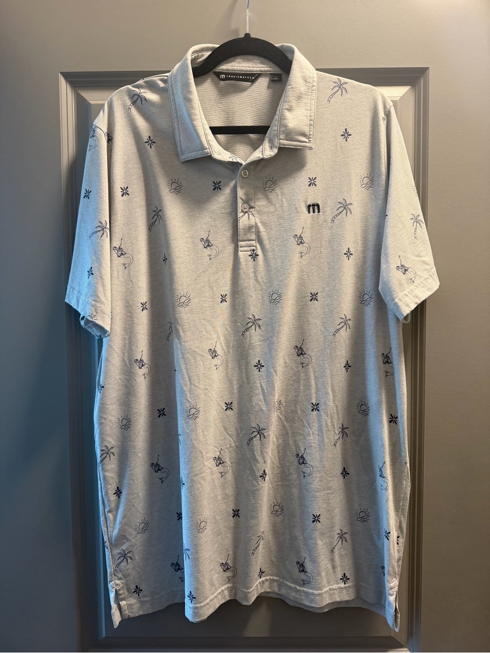 Travis Mathew Light Gray Polo with Navy Tropical Print